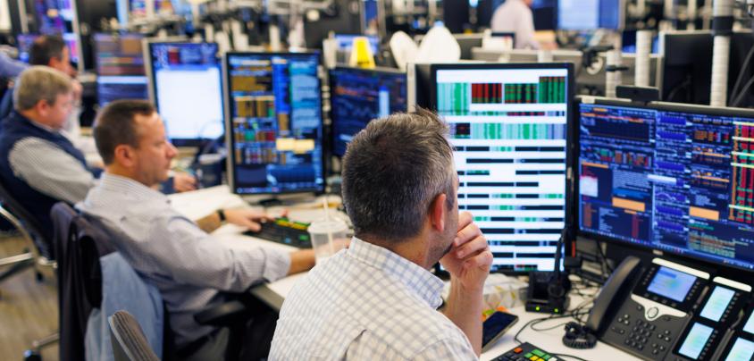 Investors reviewing finances